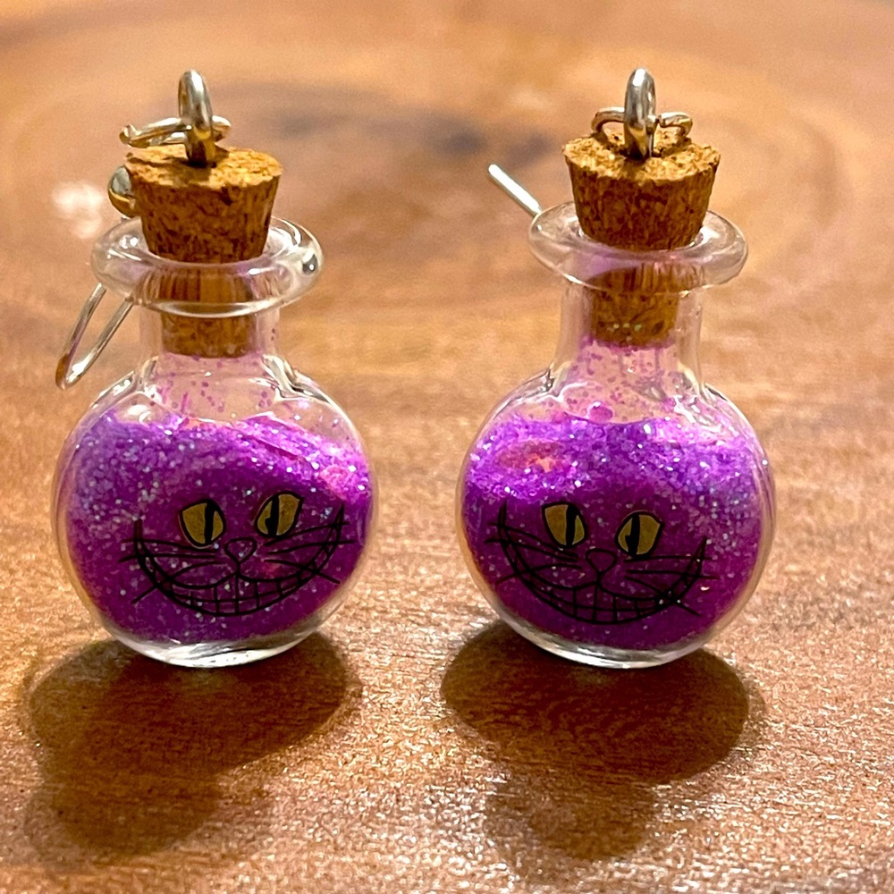 Alice in wonderland cat earrings